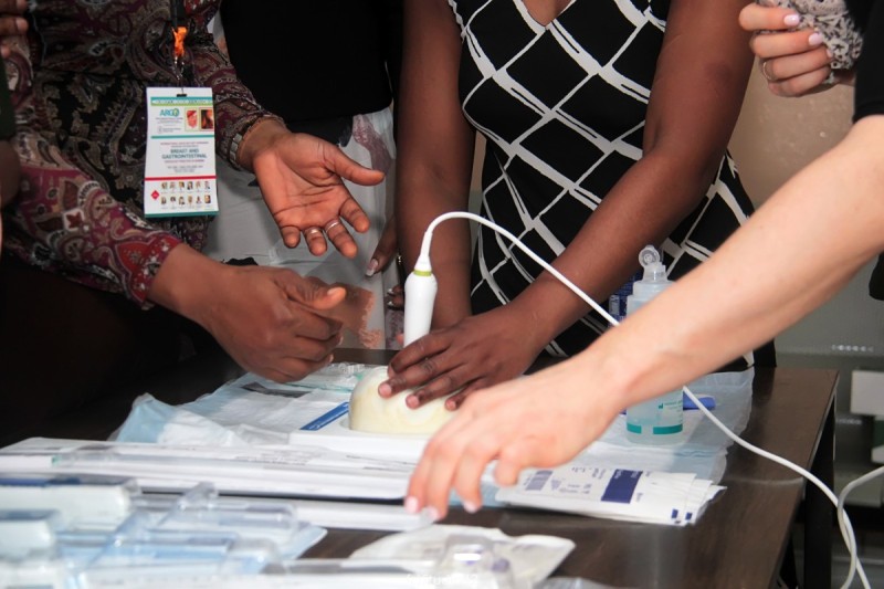 Teaching ultrasound guided breast biopsies using the mobile ultrasound unit and a breast phantom.