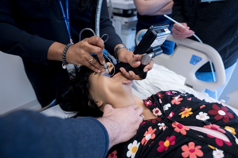 Dr. Prabalini Rajendram demonstrates intubation using a portable video laryngoscope, with ET tube, over the bougie. 