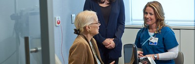 Woman preparing for chemotherapy with nurse and caregiver at Memorial Sloan Kettering Westchester