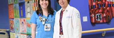 Gabriella and Roseann Tucci pose on a Pediatrics floor